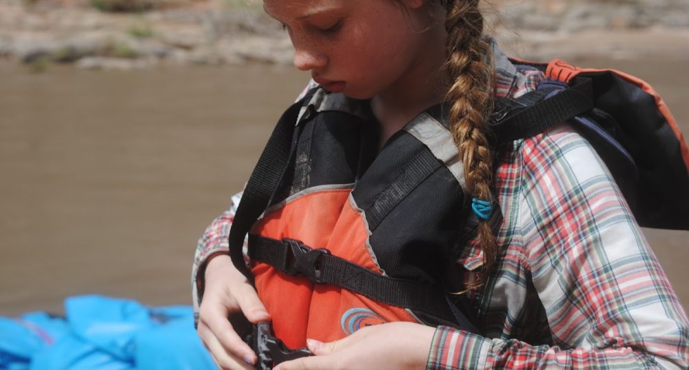 grand canyon youth buckling up personal floatation device why