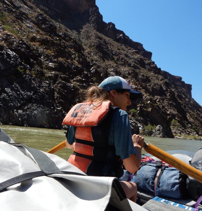 Grand Canyon Youth participant rowing a boat