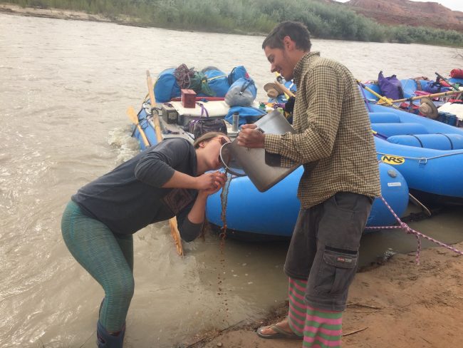 Grand Canyon Youth guides drinking coffee from a large pot